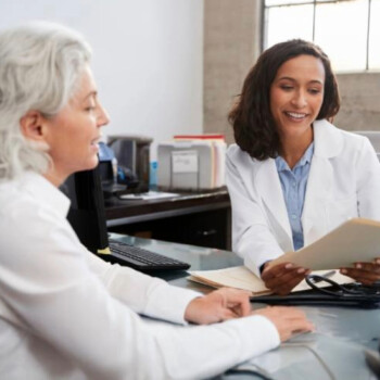 Female provider discussing treatment plan with female middle-age patient